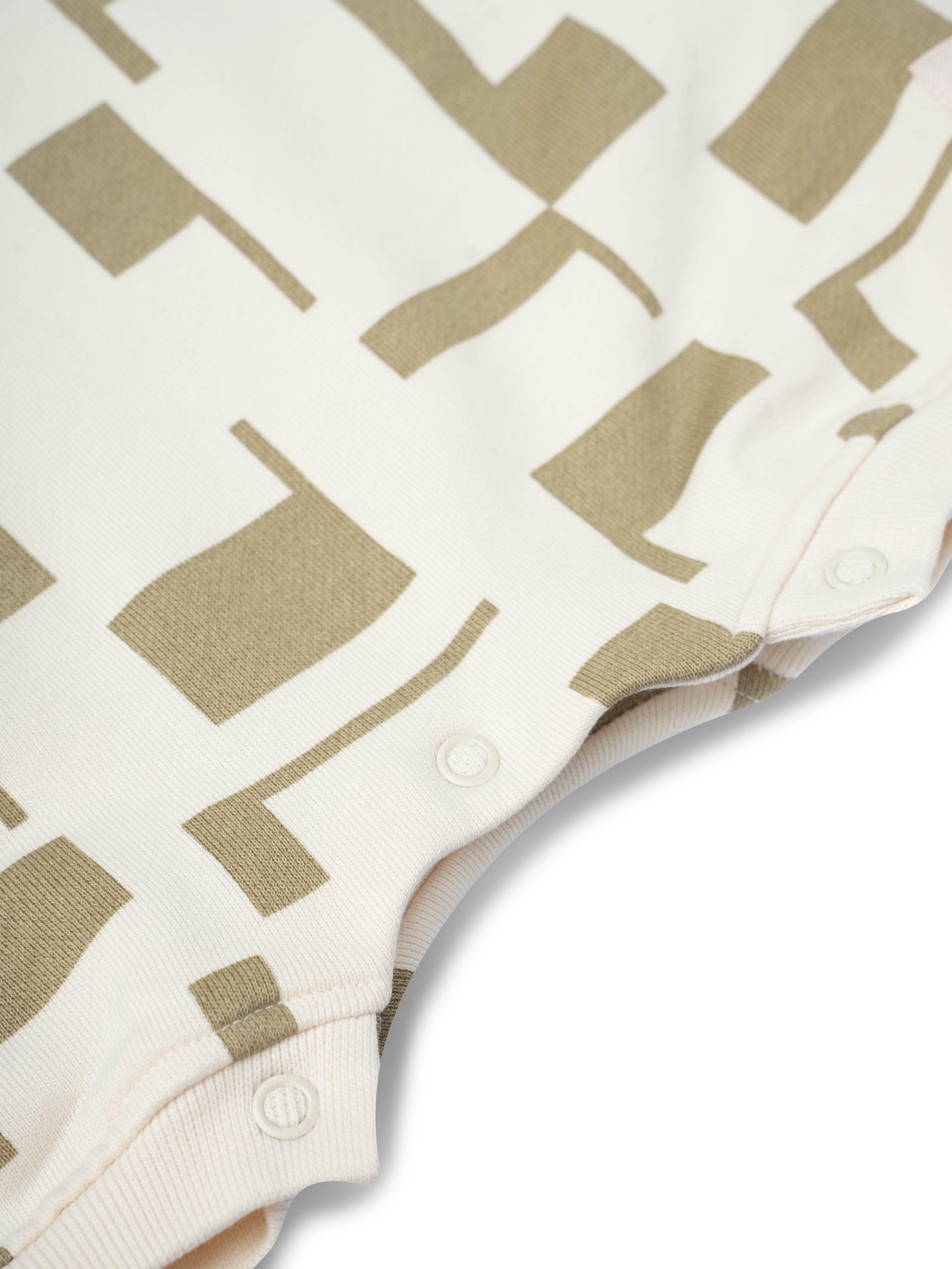 Grenouillère oversize en coton – Beige à motif vert olive